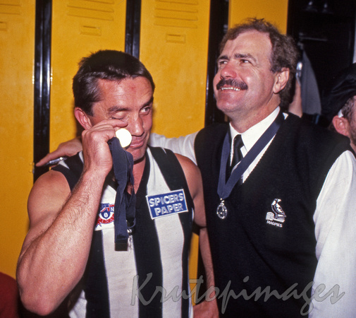 Collingwood captain Tony Shaw and coach Leigh Mathews after winning 1990 AFL Grand Final