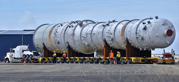 refinery vessel is loaded onto a transporter multi wheeled vehicle at Barry Beach Marine Terminal-5