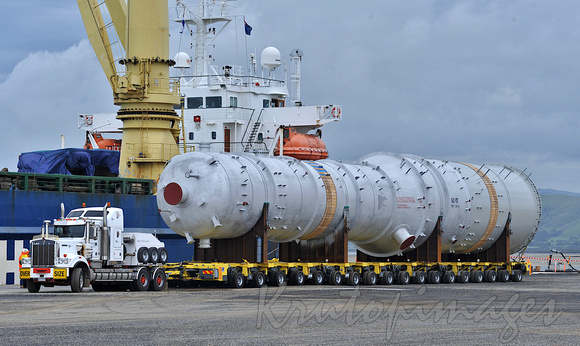refinery vessel is loaded onto a transporter multi wheeled vehicle at Barry Beach Marine Terminal-6