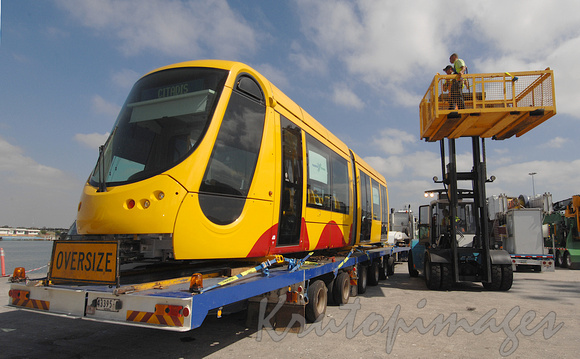New articulated tram made in France arrives at Web Dock checked for problems during quarantine inspection