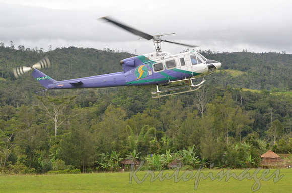 Helicopter landing at camp PNG