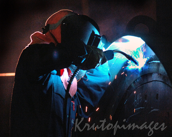 welder working in a confined space at power station-1