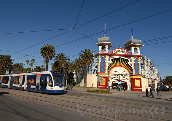 New tram passes thge Luna Park entrance in St Kilda