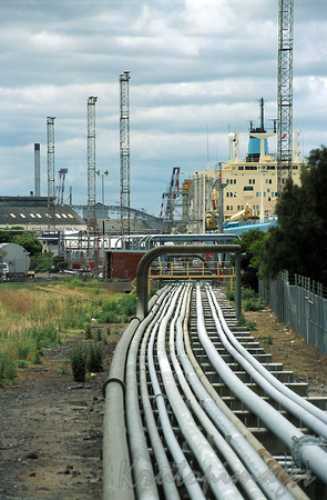 steel pipes transporting fuel from the wharf of a terminal to the processing and storage areas