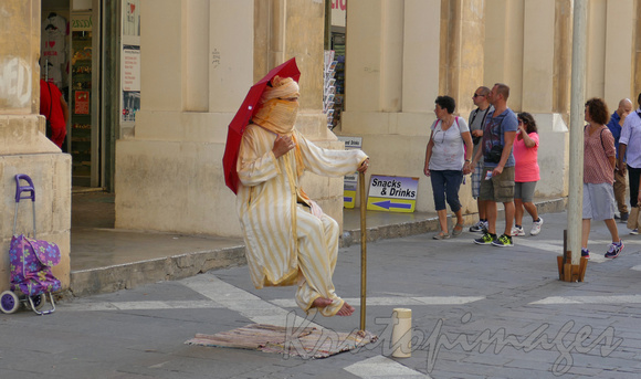 Valetta, capital of Malta, street entertainer.