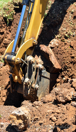 digger in trench