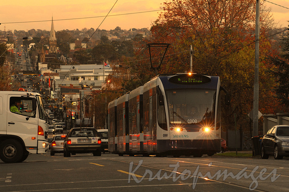 Melbourne tram climbs Glenferrie  road Hawthorn at sunset